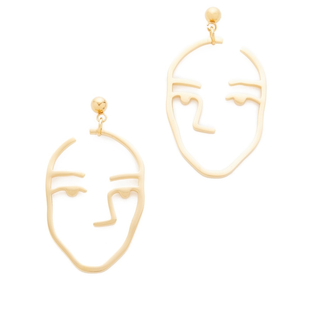 Amber Sceats face earrings